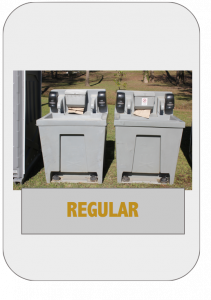 A pair of large metal bins with speakers on top.