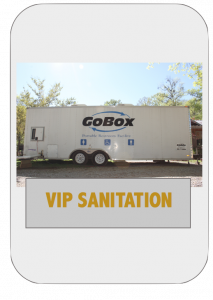 A white trailer with the words " vip sanitation ".